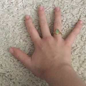 Gold costume jewelry with stone.